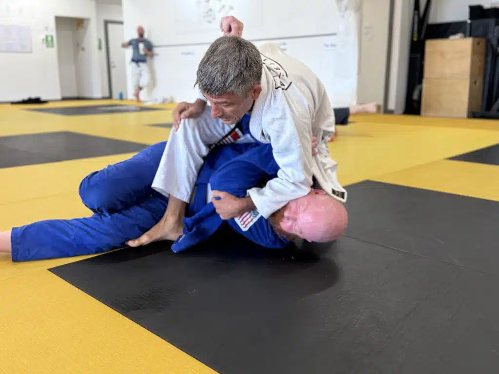 Black belt coach teaching Brazilian Jiu Jitsu in Portland at Five Rings Jiu Jitsu Portland
