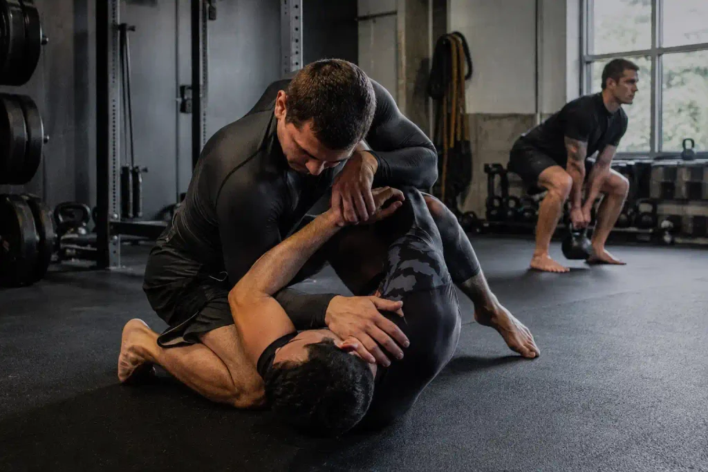Coach guiding Grapplers through functional conditioning in Portland
